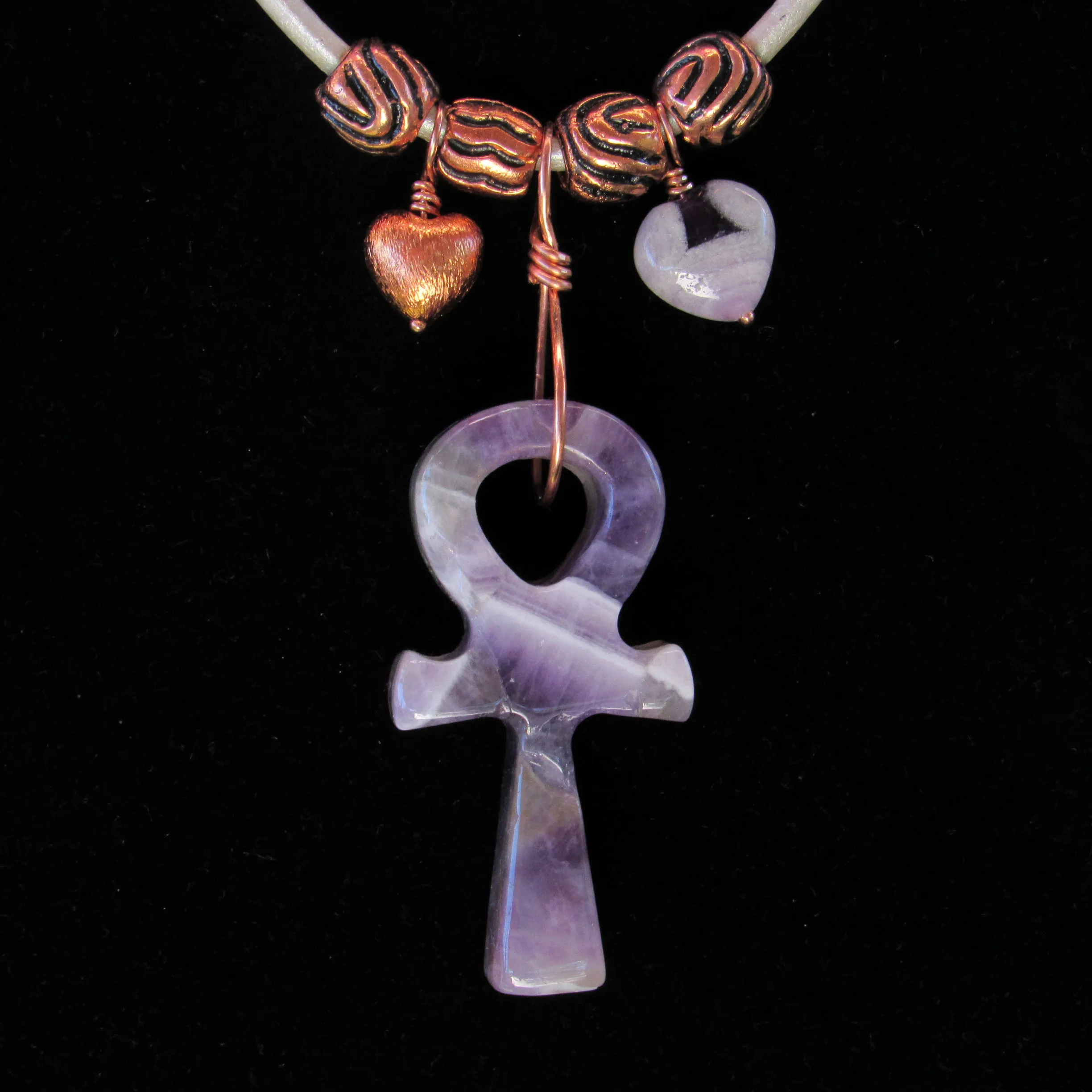 Amethyst gemstone carved Ankh pendant with copper on leather necklace