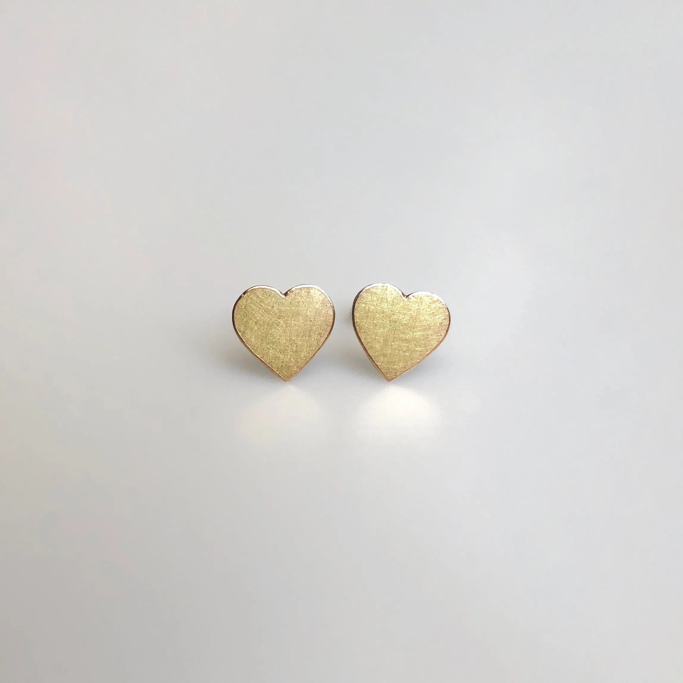 Heart stud earrings in reclaimed 14k gold, medium