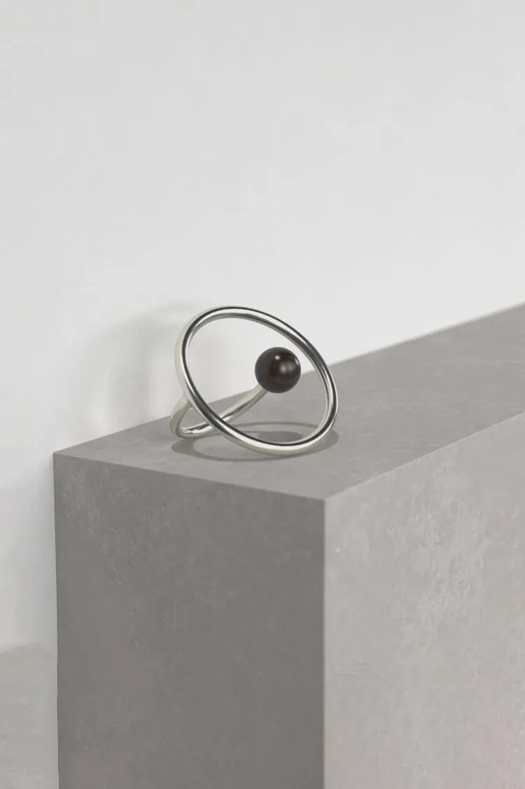 Silver ring with black pearl